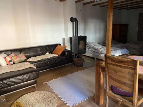 Χώρος καθιστικού στο Einzimmerapartment mit Fass Sauna (und Pool)