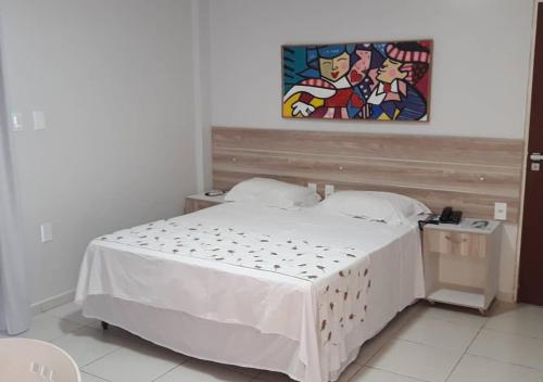 Ένα ή περισσότερα κρεβάτια σε δωμάτιο στο Hotel Sol Nascente