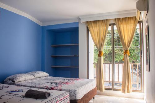 Postel nebo postele na pokoji v ubytování Casa hotel las gaviotas II