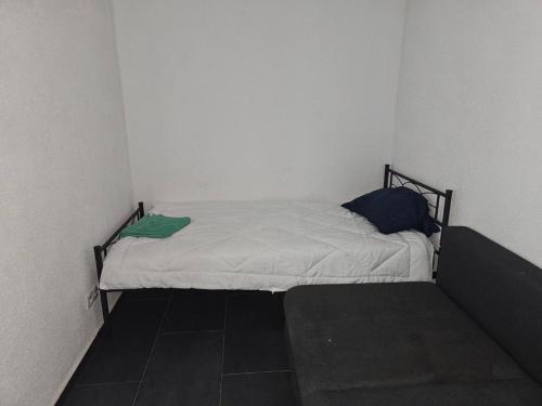 Voodi või voodid majutusasutuse Maria Zimmer im UG Neu und Modern toas
