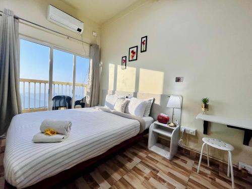 Voodi või voodid majutusasutuse Aizawl Guest House Apartments toas