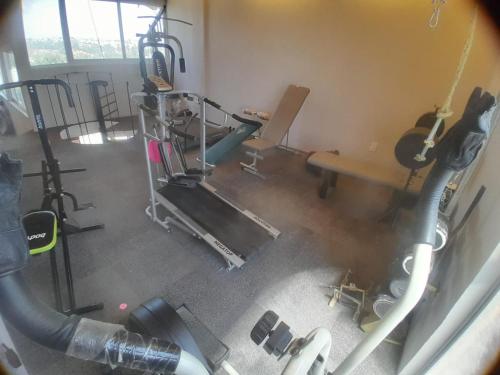 an overhead view of a gym with machines and weights at Casa Bosques in Cuautitlán Izcalli