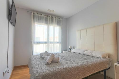 Postel nebo postele na pokoji v ubytování 009 - Residencial Bahía 001 - comfortHOLIDAYS