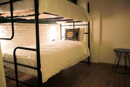 Una cama o camas en una habitación de THINK HOTEL