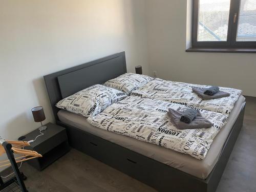 Postel nebo postele na pokoji v ubytování Apartmán pod Pálavskými vrchy