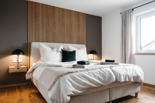 Ένα ή περισσότερα κρεβάτια σε δωμάτιο στο Design Apartment 128qm mit Ausblick