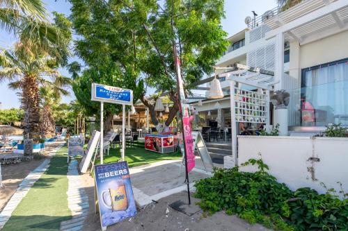 a sign for a playground in front of a building at Lido Star in Faliraki