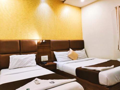 Postel nebo postele na pokoji v ubytování Hotel Avion Palace