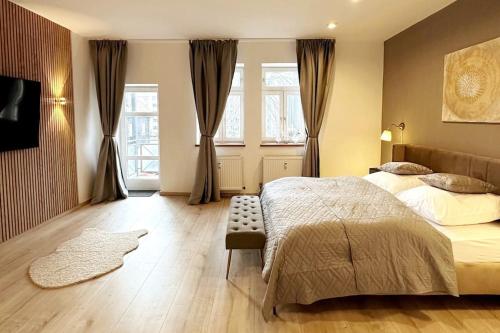 Een bed of bedden in een kamer bij Stilvolle Wohnung in Bestlage