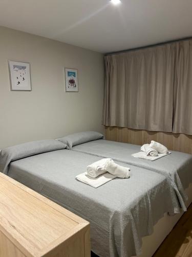 Llit o llits en una habitació de Primavera Premium Sierra Nevada 2