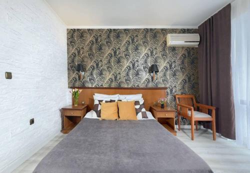 Postel nebo postele na pokoji v ubytování Hotel Yo