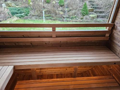 a wooden sauna with a view of a window at RentMySpaHomeDOTcoDOTuk in Chesterfield