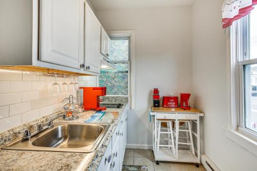 a kitchen with a sink and a window at Family-Friendly Ocean City Condo Walk to Beach! in Ocean City