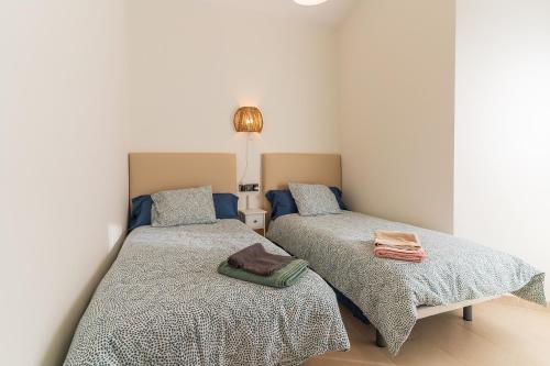Posteľ alebo postele v izbe v ubytovaní Pareado con piscina en el Rompido