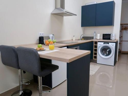 Kuchyň nebo kuchyňský kout v ubytování Olá Mar