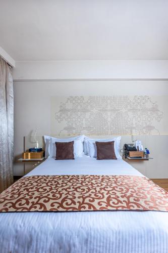 Una cama o camas en una habitación de Kenzi Sidi Maarouf