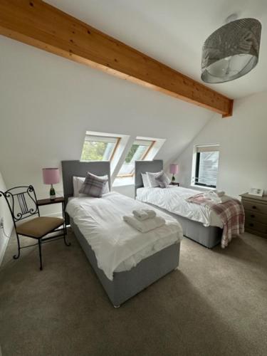 Ένα ή περισσότερα κρεβάτια σε δωμάτιο στο Highland Holiday Home