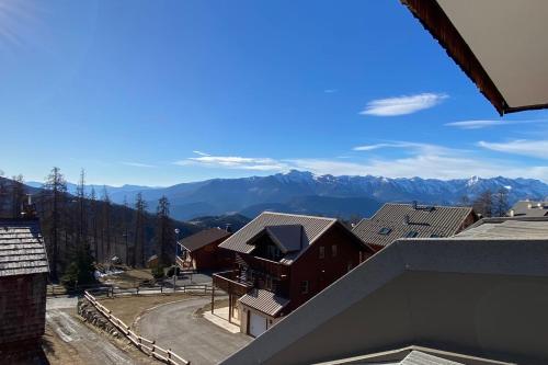a view of the mountains from a balcony of a house at 06BC - Valberg ski station 4-person apartment 300m from the slopes in Guillaumes