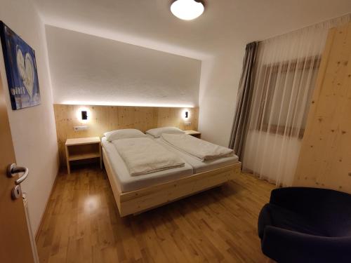 Ένα ή περισσότερα κρεβάτια σε δωμάτιο στο Residence Klementhof