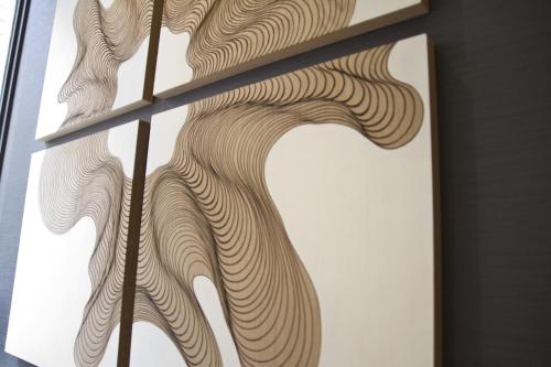 a wall mural of a wave pattern on a wall at Carris Cardenal Quevedo in Ourense