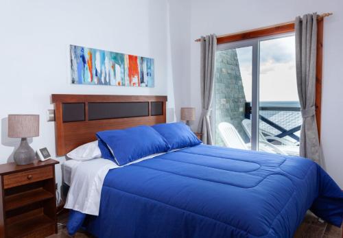 Katil atau katil-katil dalam bilik di Apart Hotel Ina Lafken