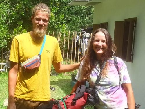 a man and a woman posing for a picture at AB Nest Hiriketiya in Dickwella