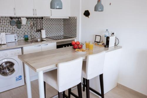 Η κουζίνα ή μικρή κουζίνα στο Like-Home - Studio-Sea view, beach