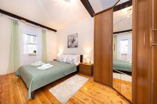 Ένα ή περισσότερα κρεβάτια σε δωμάτιο στο Apartment Centar