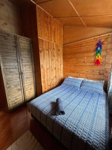 Katil atau katil-katil dalam bilik di CASA LA KOCHA, Cabin, Hostal en la Laguna de la Cocha
