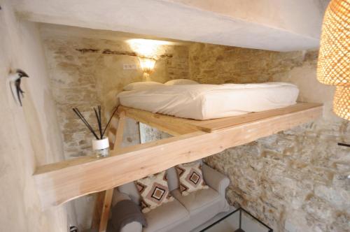 a bed on a shelf in a tiny house at 209 Livingtarifa Catamaran in Tarifa