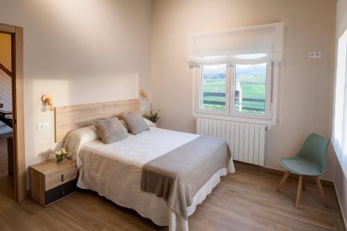 Cama o camas de una habitación en Apartamentos Alto Ubiro