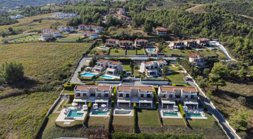an aerial view of a villa with a resort at Bellevue Villas with private pool in Hanioti