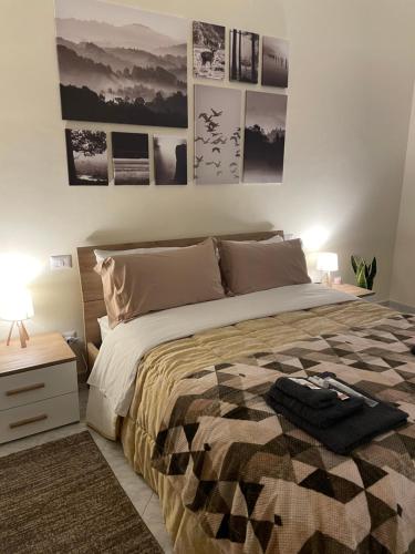 Postel nebo postele na pokoji v ubytování Civita Home Experience