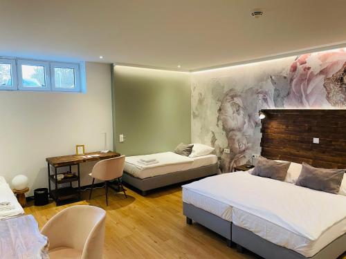 Ένα ή περισσότερα κρεβάτια σε δωμάτιο στο Hotel Wiesengrund Business & Boutique