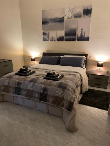 Postel nebo postele na pokoji v ubytování Civita Home Experience