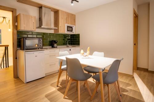 Una cocina o zona de cocina en Apartamentos Alto Ubiro
