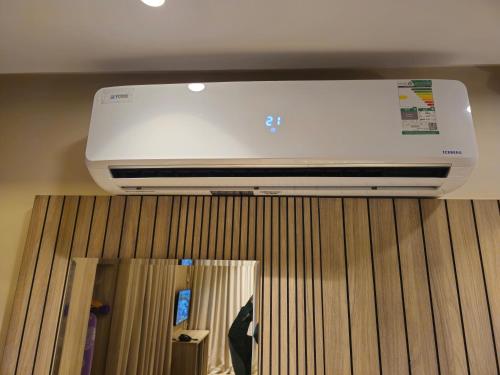 a printer on top of a shelf in a room at فندق سي قل - Sea gull Hotel in Umm Lujj