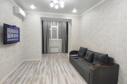Χώρος καθιστικού στο Shanyrak apartments, 2 Комн