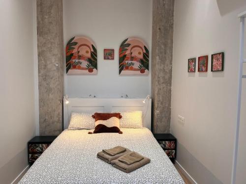 Postel nebo postele na pokoji v ubytování Mestalla Garden