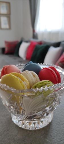 a glass bowl filled with different types of fruit at Odisea Hill House - Modern Holiday Home with swimming pool, sauna, jacuzzi, WiFi and 2 bedrooms, near Varazdin in Gačice