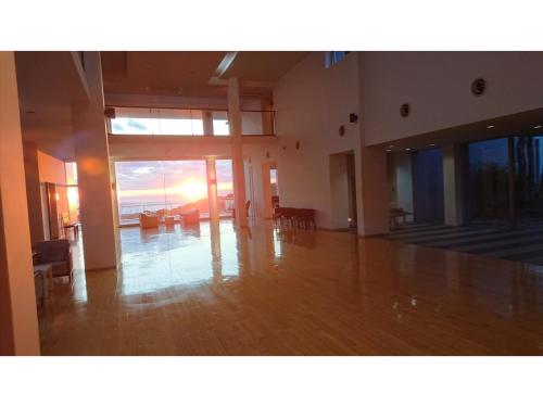 an empty living room with a view of the ocean at Shonan Relief - Vacation STAY 50852v in Yokosuka