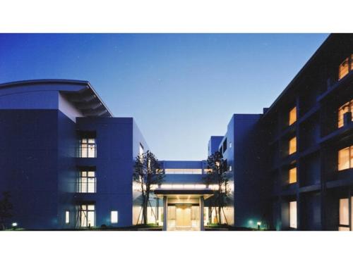 a large blue building in front of a building at Shonan Relief - Vacation STAY 50852v in Yokosuka