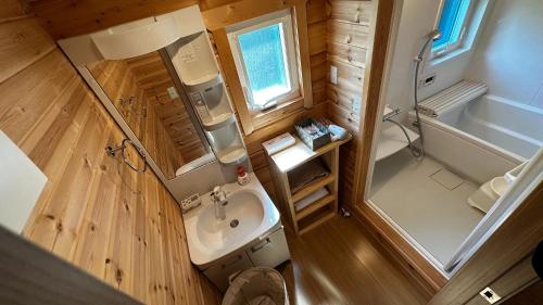 an overhead view of a bathroom in a tiny house at Asahikawa City - Camp - Vacation STAY 62748v in Chikabumichō