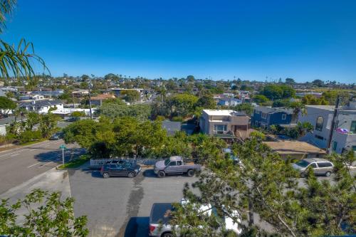 an aerial view of a city with cars parked in a parking lot at Oceanfront, Luxury Remodel, Pool, Walk To Dining in Encinitas