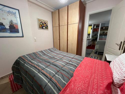 Postel nebo postele na pokoji v ubytování Alonaki House