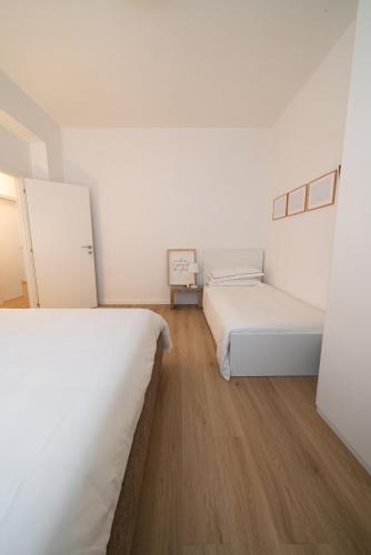 Ένα ή περισσότερα κρεβάτια σε δωμάτιο στο 12 living