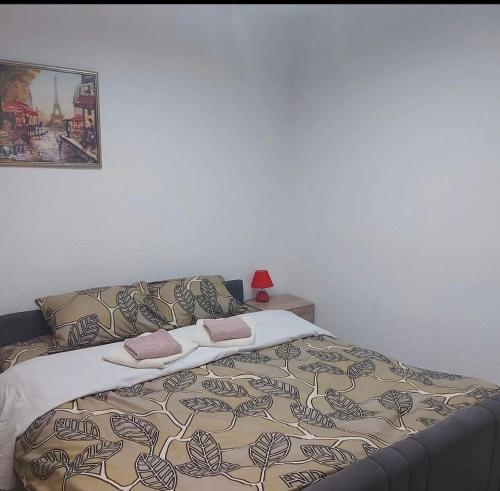 Una cama o camas en una habitación de Hostel Yugoslavija 1