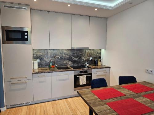 Nowoczesny i komfortowy apartament przy ulicy Kurpiowskiej blisko centrum miasta