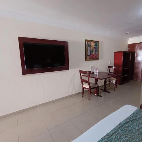 Гостиная зона в Hotel Confort Plaza