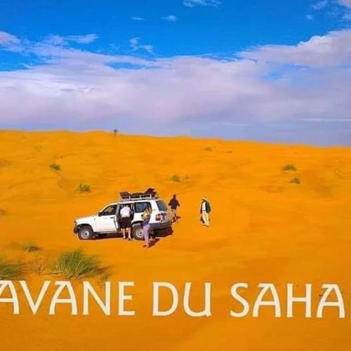 a poster of a car in the desert at Private Camp25km-from DOUZ in Douz